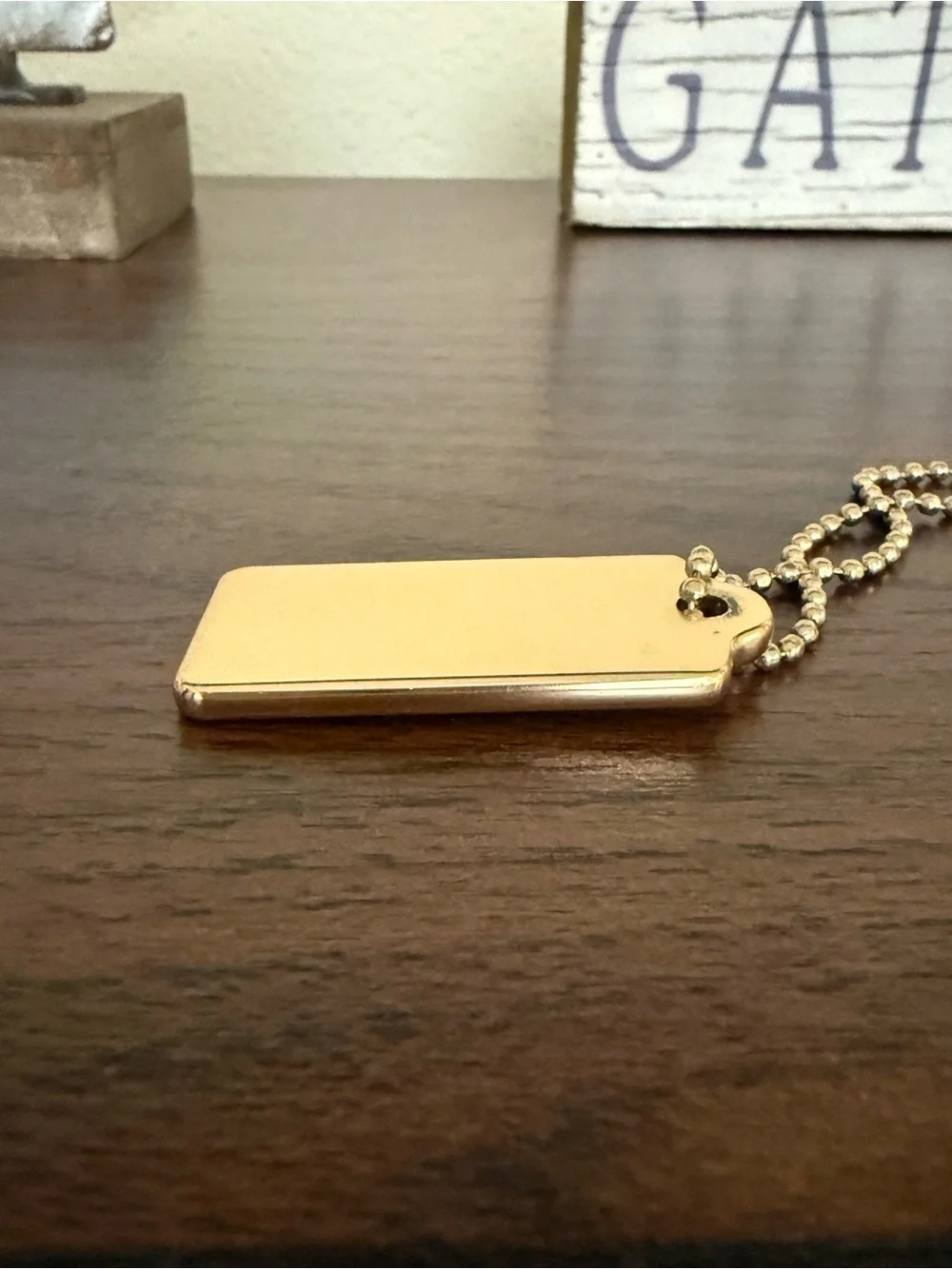 Coach Gold Hangtag with Ball Chain